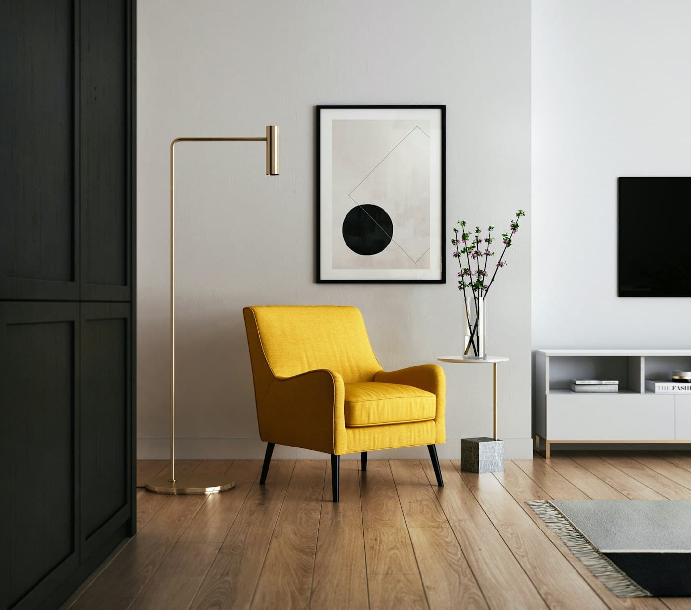Elegant living room of a holiday rental: gold armchair, brass lamp, warm parquet floor